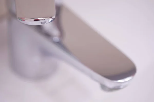 Chrome water tap. Faucet close-up. Macro photo. — Stock Photo, Image