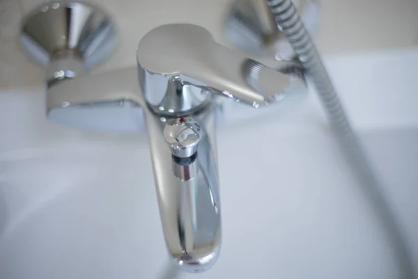 Chrome water tap, top view. Shiny faucet closeup. — Stock Photo, Image