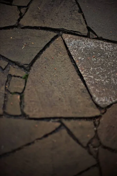 Primer plano del suelo de piedra salvaje. Patrón formas irregulares . — Foto de Stock