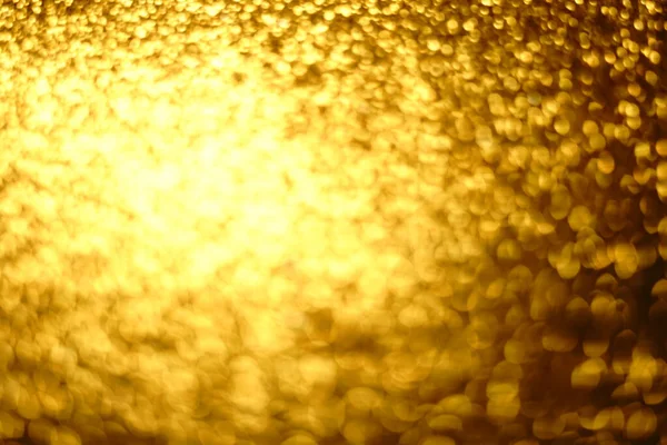 Ouro rico fundo brilhante, ouro brilhos fundo borrado . — Fotografia de Stock