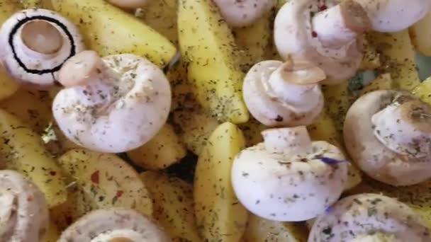 Cooking Process Raw Potato Sticks Peel Whole Mushrooms Sprinkled Seasonings — Stock Video
