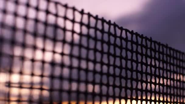 Old Rusty Steel Wire Mesh Fence Brown Sunset Sky Background — Stock Video