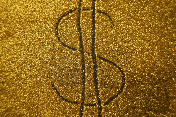 Signo del dólar sobre fondo brillante dorado —  Fotos de Stock