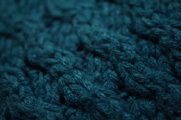 Knitted texture, dark blue thread pattern, cozy winter background. — Stock Photo, Image