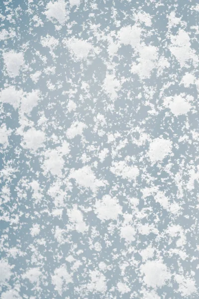 Stora snöflingor på fönstret, makro, nära upp — Stockfoto