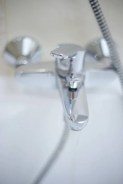 Chrome water tap. Shiny faucet closeup. — Stock Photo, Image