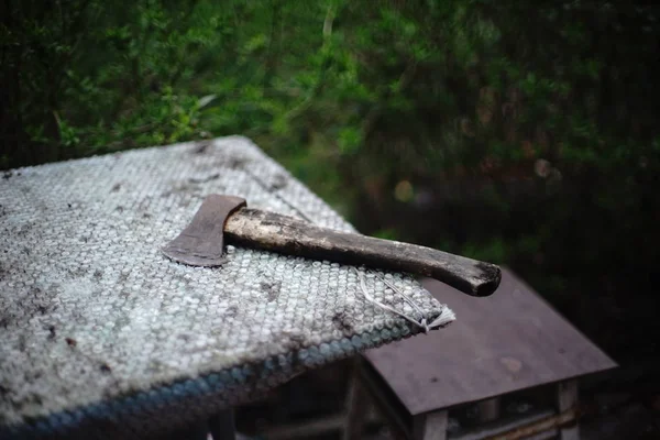 Old ax on the rural table with bubble wrap — 스톡 사진