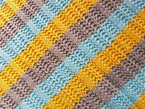 Striped sweater background. Blue, gray, yellow knitted stripes. — Stock Photo, Image
