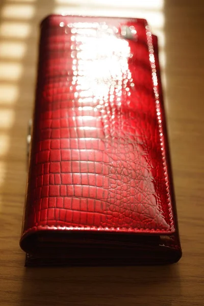 Red Lacquered Purse Brown Sunny Table — Stock Photo, Image