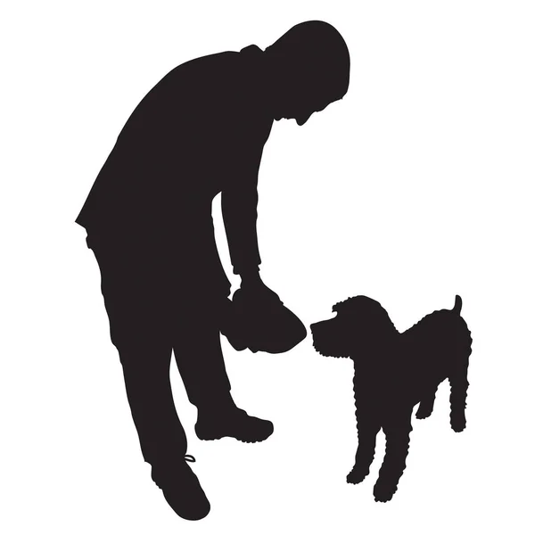 Man voeding hond — Stockvector