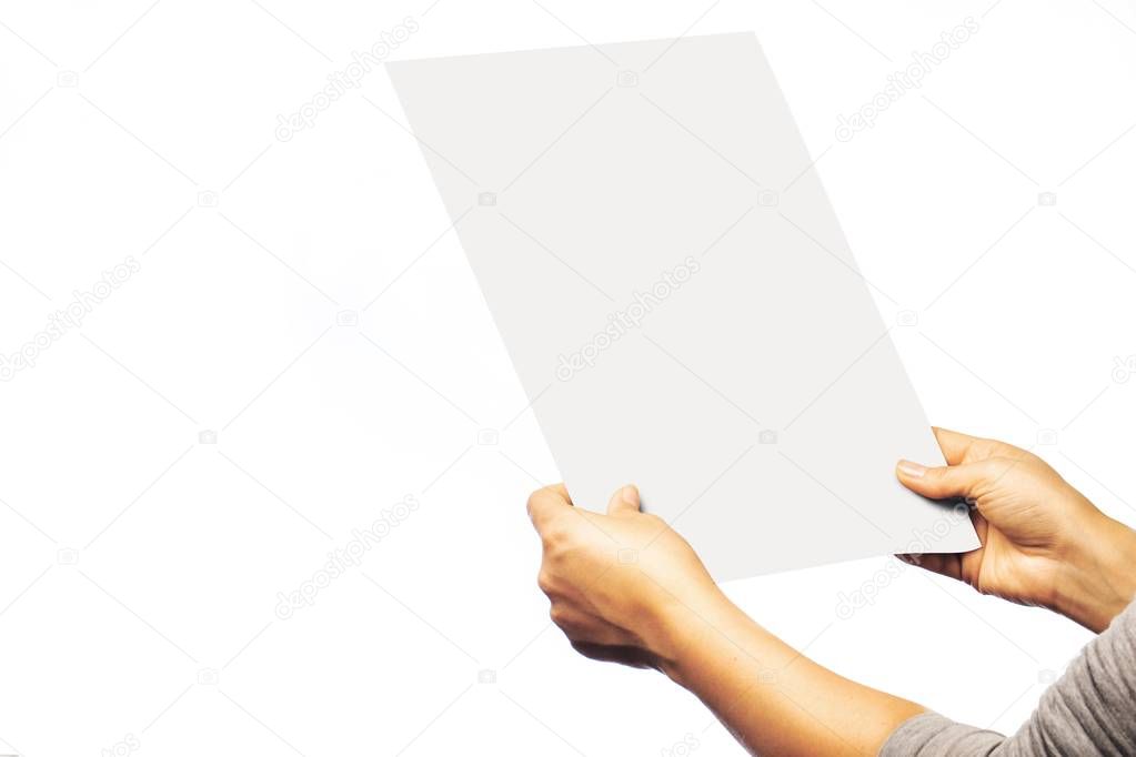 Woman in grey shirt is holding a blank poster template