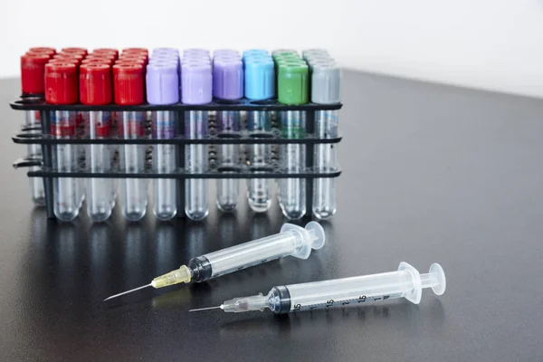 Two syringes and testubes — Stock Photo, Image