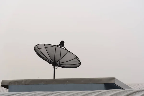 Satellite dish on the roof — Stock Photo, Image