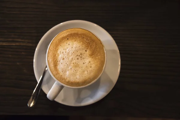 Ovanifrån av en kopp cappuccino kaffe — Stockfoto