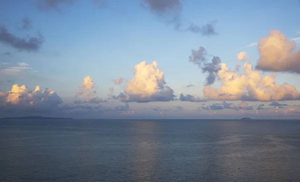 Cumulus clouds over the sea in the morning