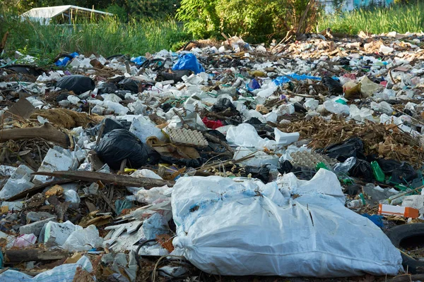 A lot of dirty garbages in open space — Stock Photo, Image