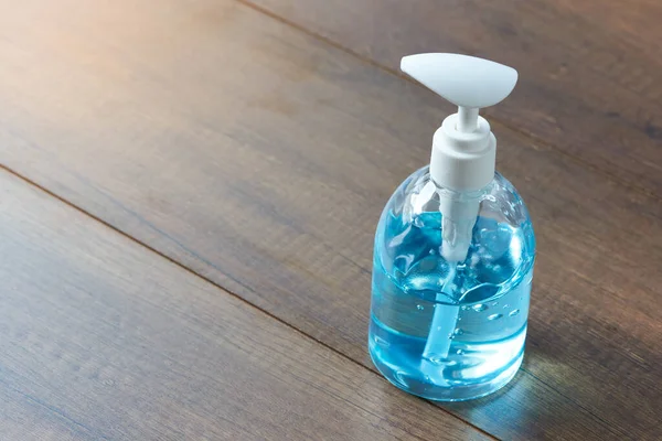 Bottle Hand Sanitizer Blue Alcohol Gel Wooden Background Alcohol Gel — Stock Photo, Image
