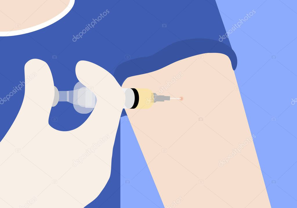 Doctor injecting  vaccine at patient arm