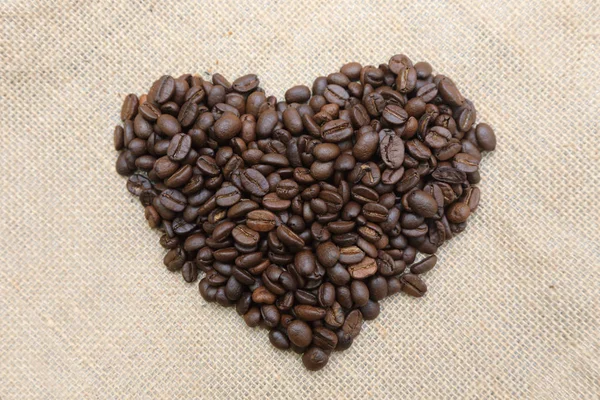 Coffee beans in heart shape — Stock Photo, Image