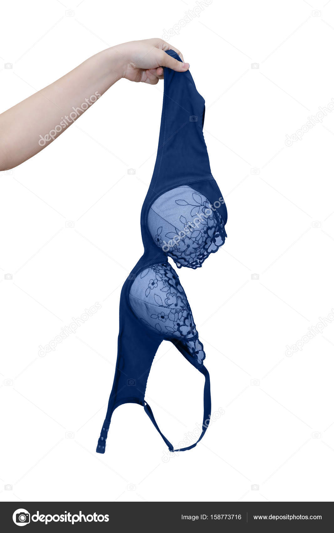Isolated woman hand holding bra Stock Photo by ©charnsitr 158773716