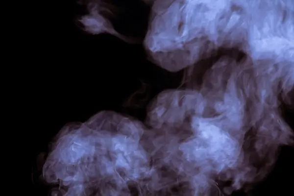 Fumaça no escuro filtrado — Fotografia de Stock