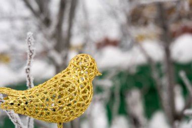 Yapay dekorasyon altın kuş
