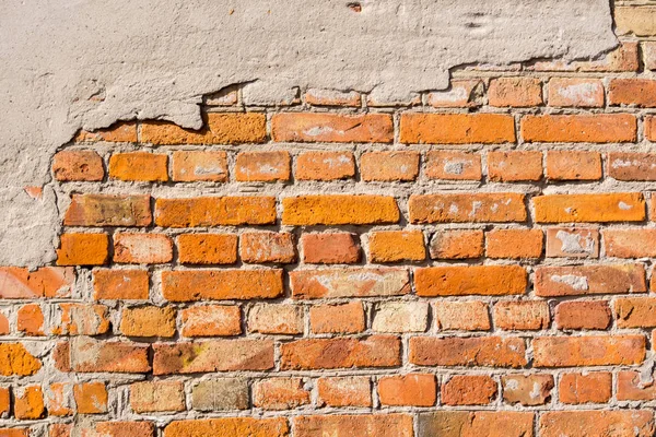 Hauswand aus Ziegelstein gebrochen — Stockfoto