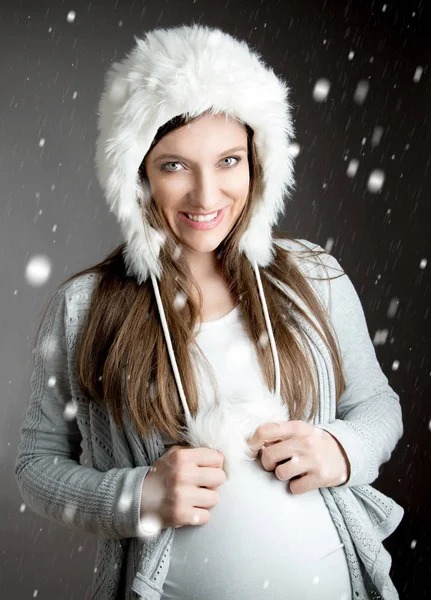 Young beautiful  in winter studio — Stock Photo, Image