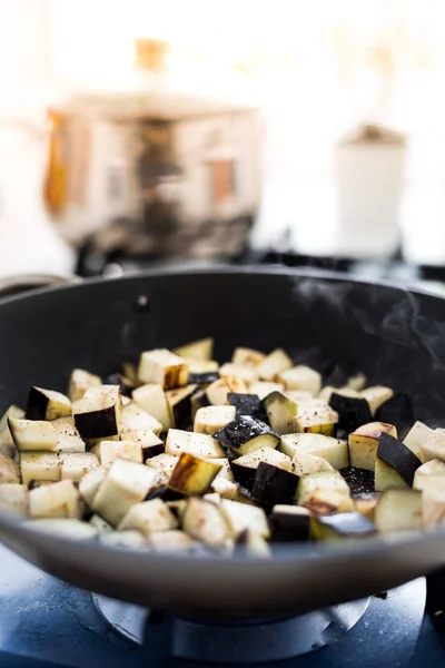 Diced eggplant in pan — Stock Photo, Image