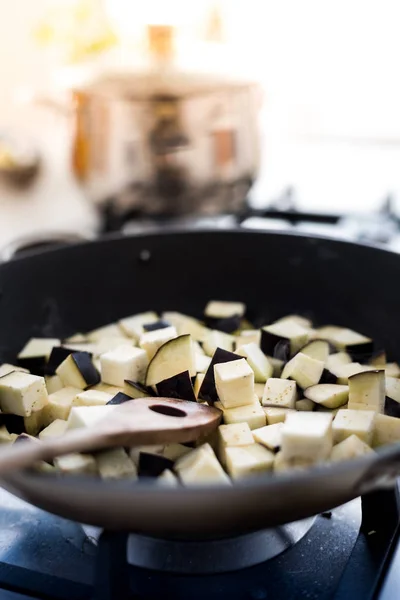 Diced eggplant in pan — Stock Photo, Image