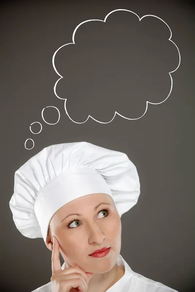 Female chef with think box — Stock Photo, Image