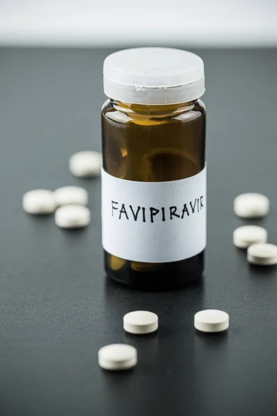 Favipiravir Farmaco Sperimentale Trattamento Covid Sfondo Scuro Drammatico Con Spazio — Foto Stock