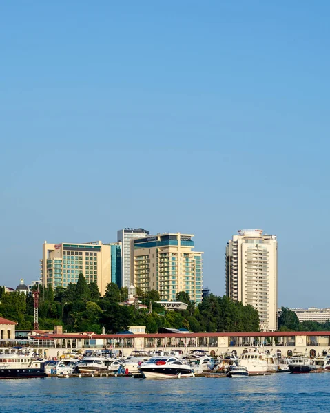 Tall modern buildings in the city, view from the sea — 스톡 사진