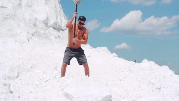 Athlete Man Shorts Doing Exercises Sledgehammer Breaks Stones Outdoor Activities — Stock Video