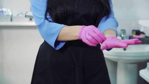 Girl Puts Pink Medical Gloves Takes Out Instruments Sterilization Apparatus — Stock Video