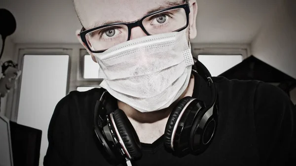 Young doctor with a headphones — Stock Photo, Image