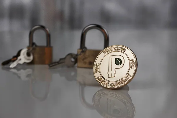 Gold peercoin coin — Stock Photo, Image