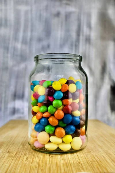 Colorful sweets in jar — Stock Photo, Image