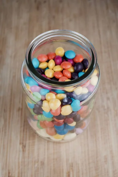 Jar with colorful sweets — Stock Photo, Image