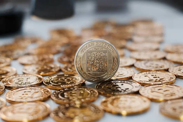Bitcoin coin on gold coins — Stock Photo, Image
