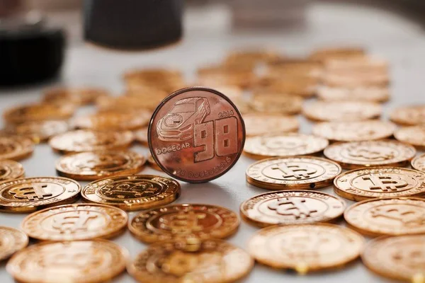 Brass dogecoin coin — Stock Photo, Image