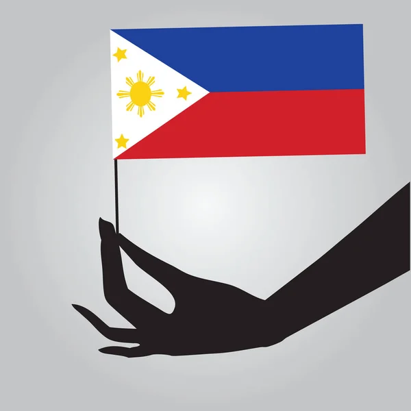 フィリピンのフラグを持つ手 — ストックベクタ