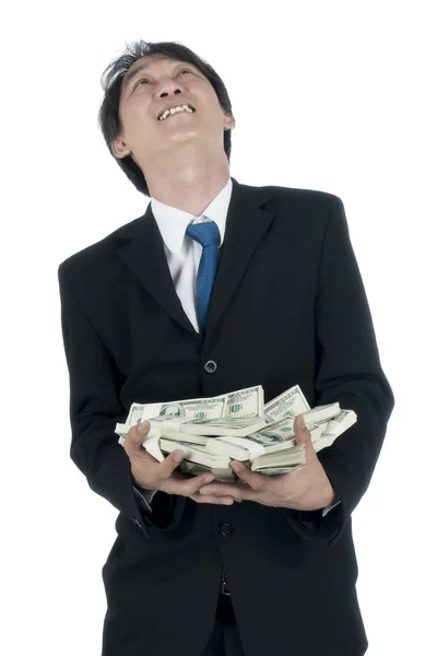 Happy businessman holding a lot of US Dollars in his hand — Stock Photo, Image