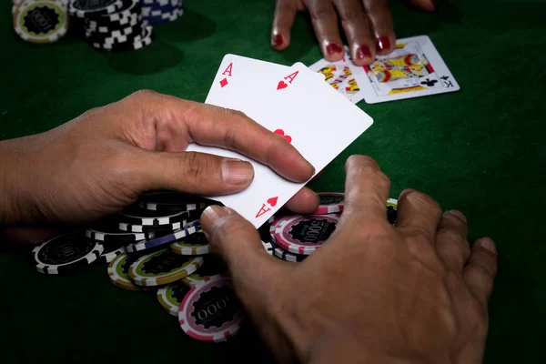 The player gather the chips stack when the points over rival — Stock Photo, Image