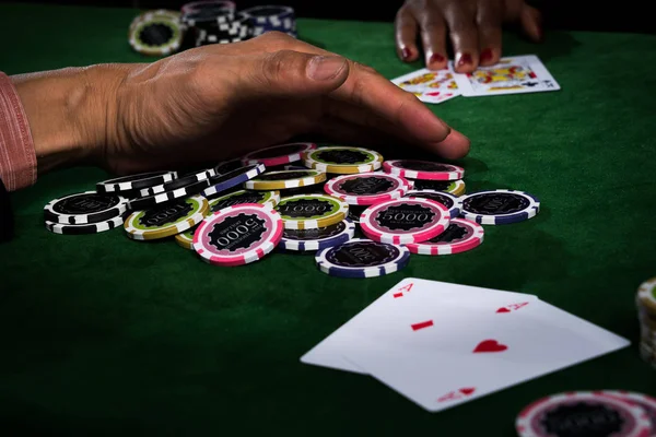 The player gather the chips stack when the points over rival on — Stock Photo, Image
