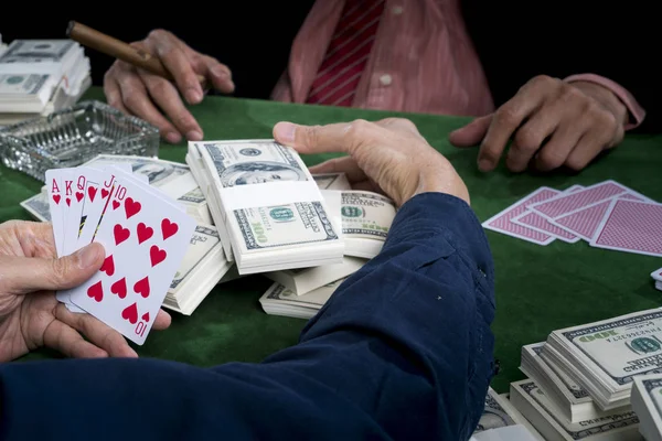 Close up at the hand of winner player gather the bets and show t — Stock Photo, Image