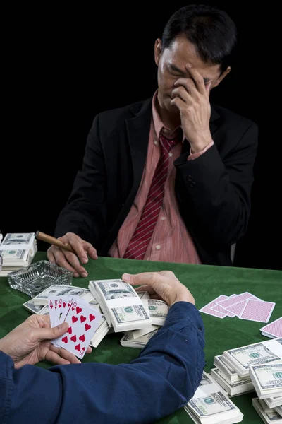 The young gambler use hand off the face and stressed when conten — Stock Photo, Image