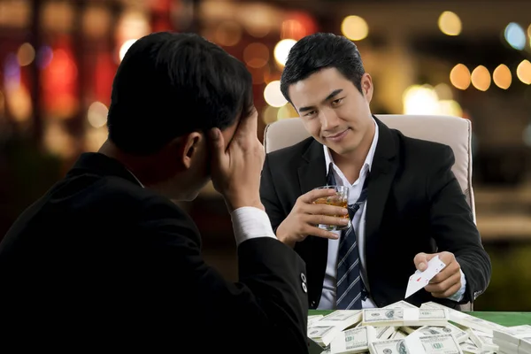 The winner poker smilling to flout the competitor — Stock Photo, Image