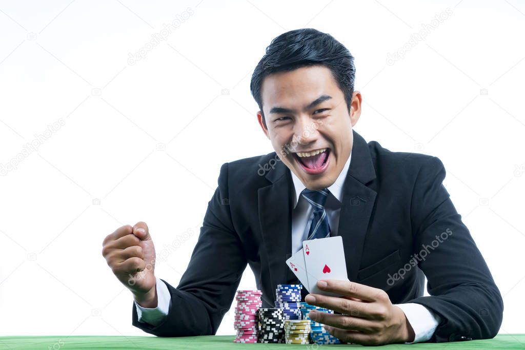 The gambler is very happy to win poker cards and recieve bet a l