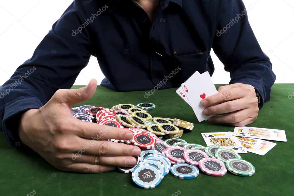 The winning poker card gather a pile of chips